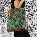 Tote Bag Irises de Vincent van Gogh, Jardin Vintage<br><div class="desc">De beaux sacs fourre-tout tout-en-un ! Disponible en deux styles et deux tailles ! Irises (1889) de Vincent van Gogh est une peinture vintage à fleurs de paysage de post impressionnisme d'art, représentant un jardin aux iris à barbe violet poussant par des pavots orange. Une seule fleur d'iris blanc fleurit...</div>