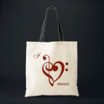 Tote Bag J'aime la musique<br><div class="desc">Qu'a pu être meilleur que la musique ? Il est créatif,  unique,  influent et vient dans toutes les variétés. Montrez votre hommage avec ce fourre-tout montrant la clef triple et basse sous forme de coeur !</div>