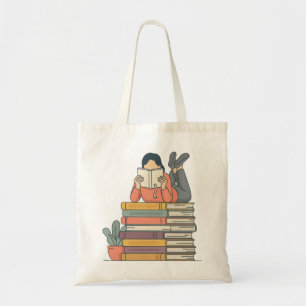 Tote Bag Jolie fille lisant sur une pile de livres
