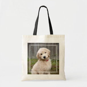 Tote Bag Le Chiot De Goldendoodle S'Assis Dans L'Herbe