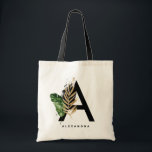 Tote Bag  Lettre A Monogram Gold Foil Tropical Personnalisé<br><div class="desc">Lettre personnalisable Un sac fourre-tout monogramme avec feuilles tropicaux aquarelles avec fausse feuille d'or et accents de brosse aquarelle. Personnalisez ce sac fourre-tout monogramme en ajoutant votre nom ou d'autres détails. Cette lettre Un sac fourre-tout monogramme sera parfait comme cadeau. D'autres lettres sont disponibles.</div>