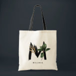 Tote Bag Lettre M Monogramme | Bridesmaid Feuille tropicaux<br><div class="desc">Sac fourre-tout monogramme M personnalisable avec aquarelle feuille de palme tropicale, fausse feuille de feuille d'or et accents de brosse d'aquarelle noire. Personnalisez ce sac fourre-tout de monogramme tropical en ajoutant votre nom ou d'autres détails. Ce sac en monogramme de lettre M boho sera parfait comme cadeau. D'autres lettres sont...</div>