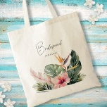 Tote Bag Magnifique Botanique Tropicale Destination Mariage<br><div class="desc">Cet élégant sac fourre-tout de mariage de destination présente de magnifiques botaniques d'aquarelle, dont des feuilles de palmiers, des hibiscus et des oiseaux de paradis. La typographie est classique mais moderne. Le script sur le devant dit "Bridesmaid" mais cela peut facilement être changé pour dire "Maid of Honor", "Mother of...</div>