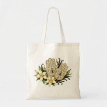 Mains Hamsa avec fleurs de vanille et mauvais œil