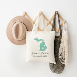 Tote Bag Mariage du Michigan Bienvenue<br><div class="desc">Bienvenue à l'extérieur de la ville mariages invités avec un sac plein de collations et des gâteries personnalisées avec l'état où vous vous mariez et le nom de la mariée et du marié et la date du mariage. Cliquez sur Customiser pour déplacer le coeur pour afficher n'importe quelle ville ou...</div>