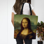 Tote Bag Mona Lisa | Léonard de Vinci<br><div class="desc">Mona Lisa (1503-1506) de l'artiste de la Renaissance italienne Leonardo da Vinci. L'oeuvre originale est l'huile sur panneau de bois de peuplier. Ce célèbre tableau est considéré comme un portrait de Lisa Gherardini, et a été acclamé comme "la plus connue, la plus visitée, la plus écrite sur, la plus chantée,...</div>