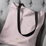 Tote Bag Monogram Blush | Elegant Gold Minimum<br><div class="desc">A simple stylish custom monogram design in a gold minimalist typographiy on an elegant pastel blush pink background. The monogram initials and name can easily be personalized along with the feature line to make a design as unique as you are! Le parfait poison de l'accessoire pour un instant.</div>