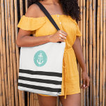 Tote Bag Monogramme d'Ancre nautique noir et aquatique<br><div class="desc">Personnalisez ce sac fourre-tout rayé noir et blanc au chic nautique avec votre double monogramme initial sur un badge d'aqua bleu turquoise estivale. Le design comprend une bande de larges bandes horizontales noires sur le fond, surmontée d'un badge d'ancre nautique encadré par vos initiales. Les bandes se répètent à l'envers....</div>