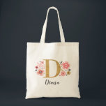 Tote Bag Monogramme Élégant Nom Initial Or Rose<br><div class="desc">Un beau sac fourre-tout floral rose monogrammé féminin avec des fleurs roses et une lettre monogrammée en faux or "D". Personnalisez le sac en ajoutant votre nom sous le monogramme. Fait un beau cadeau pour une amie ou pour une demoiselle d'honneur. Conçu pour vous par Blackberry Boulevard.</div>