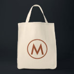 Tote Bag Monogramme en terre cuite minimaliste élégant<br><div class="desc">Ce design de sac fourre-tout moderne dispose d'un monogramme minimaliste élégant avec votre initiale en élégante typographie en terre cuite pour un look simple et professionnel.</div>