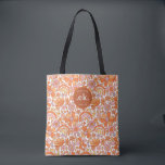 Tote Bag Monogramme Floral Orange Rétro Groovy<br><div class="desc">Le sac fourre-tout à monogramme Groovy Retro Orange Florals est un accessoire élégant et fonctionnel parfait pour toutes les occasions. Avec son motif floral orange audacieux et son monogramme personnalisé, ce fourre-tout ajoute une touche de couleur vibrante à votre garde-robe. Assez spacieux pour transporter tous vos essentiels, que vous alliez...</div>