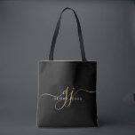 Tote Bag Monogramme or noir<br><div class="desc">Un chic monogramme d'or blanc sur le sac fourre-tout noir, avec un script initial spectaculaire avec des swashes et votre nom complet dans un type serif moderne, </div>