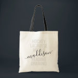 Tote Bag Monogramme tendance Script Sport et loisir<br><div class="desc">Personnalisé Monogramme Nom Sac fourre-tout avec texte et libellé modifiables pour une liste de ses sports et hobbies préférés fait un cadeau amusant et utile pour la fille toujours en déplacement et dans beaucoup d'activités parascolaires. Cet exemple montre "hockey, crosse, randonnée, lecture, dessin" mais le texte peut être changé en...</div>