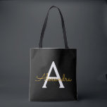 Tote Bag Noir Nom Gold White Girl Script Monogramme moderne<br><div class="desc">Black and Gold Elegant Ajoutez votre propre nom Monogram Book Bag. Ce sac de livre peut être customisé pour inclure votre nom initial et prénom et donné comme cadeau pour Noël,  Sweet 16 Anniversaire,  Fête des mariées ou Mariage.</div>