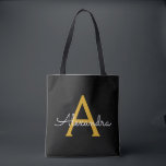 Tote Bag Noir Nom Gold White Girl Script Monogramme moderne<br><div class="desc">Black and Gold Elegant Ajoutez votre propre nom Monogram Book Bag. Ce sac de livre peut être customisé pour inclure votre nom initial et prénom et donné comme cadeau pour Noël,  Sweet 16 Anniversaire,  Fête des mariées ou Mariage.</div>
