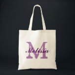 Tote Bag Nom de monogramme personnalisé Purple<br><div class="desc">Nom de monogramme personnalisé Sac fourre-tout pourpre. Design élégant de logo monogramme avec initiales monogrammées dans une police grunge et nom dans une police de caractères violet foncé. Remplacez facilement les initiales du monogramme modèle et le nom par votre propre idée de cadeau mignon pour tous à un mariage spécialement...</div>