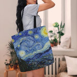 Tote Bag Nuit étoilée | Vincent van Gogh<br><div class="desc">Starry Night (1889) de l'artiste néerlandais Vincent Van Gogh. L'oeuvre originale est une huile sur toile représentant un ciel nocturne post-impressionniste énergique dans des tons moody bleu et jaune. Utilisez les outils de conception pour ajouter du texte personnalisé ou personnaliser l'image.</div>