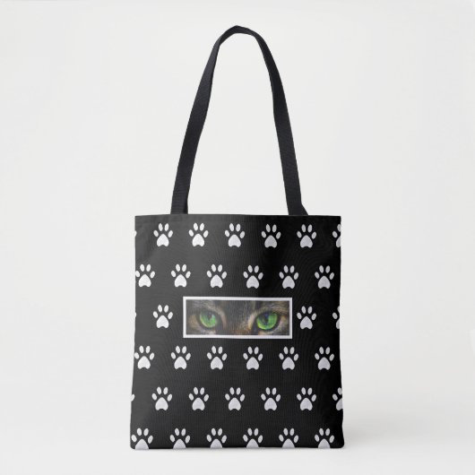 Tote Bag Oeil de chat élégant et motif de pattes sur noir & (Devant)