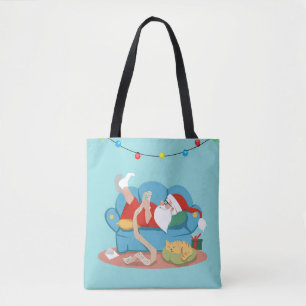 Tote Bag Père Noël sur le canapé en pyjama