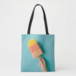 Tote Bag Personne tenant un coquelicot jaune et rose