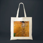 Tote Bag Portrait de Gustav Klimt<br><div class="desc">Cette peinture populaire de Klimt est intitulée "Portrait d'Adele Bloch-Bauer" et a été peinte en 1907. Gustav Klimt (14 juillet 1862 - 6 février 1918) était un peintre symboliste autrichien et l'un des membres les plus importants du mouvement de sécession de Vienne. Klimt est réputé pour ses peintures, ses peintures...</div>