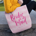 Tote Bag Preppy Pink Stripes Brush Script Bridesmaid<br><div class="desc">Sac fourre-tout Bridesmaid personnalisé avec le mot "Bridesmaid" dans le script de brosse tendance contre un arrière - plan preppy rose stripes qui est parfait pour votre demoiselle d'honneur pour porter ses articles. Consultez le sac de maquillage correspondant ici https://www.zazzle.com/preppy_pink_stripes_brush_script_bridesmaid_makeup_bag-223977580678893594?rf=238364477188679314 Personnalisez-le en remplaçant le texte de l'espace réservé. Pour plus...</div>