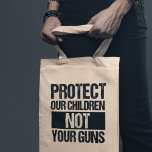 Tote Bag Protégez nos enfants et non vos armes<br><div class="desc">Protégez nos enfants, pas vos sacs fourre-tout d'armes. Appuyer la réforme des armes à feu et le renforcement des lois sur les armes à feu, le contrôle des arrière - plans et rendre obligatoire l'éducation sur les armes à feu. Arrêtez de tuer nos enfants et d'interdire les armes automatiques. Les...</div>