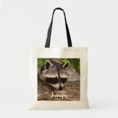 Tote Bag Raccoon mignon reposant sur un journal (Devant)