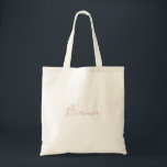 Tote Bag Rose Gold Simple Minimaliste<br><div class="desc">Ce sac fourre-tout de femme de chambre minimaliste en or rose est le cadeau mariage idéal pour présenter vos demoiselles d'honneur et votre femme de chambre d'honneur pour un mariage moderne. Le design sobre et élégant présente une typographie de script classique et sophistiquée en or rose.</div>