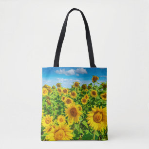 Tote Bag Terrain de tournesol en été par temps ensoleillé.