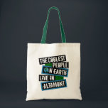 Tote Bag The Coolest People on Earth Live in Altamont<br><div class="desc">This design features bold, layered text with the phrase "The Coolest People on Earth Live in Altamont" in a striking cool color palette. A globe graphic, integrated with coordinating blue and green blocks, symbolizes the city's global appeal. The design is suitable for showcasing local pride, as it boldly declares Altamont's...</div>