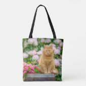 Tote Bag Un chat orange dans un jardin aux fleurs de printe (Dos)