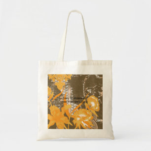 Tote Bag Un motif décoratif de fleurs et de feuilles contre