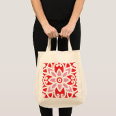 Tote Bag un motif rouge et blanc avec une fleur (Devant (produit))