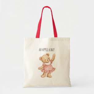 Tote Bag Un ours à robe rouge une pomme par jour