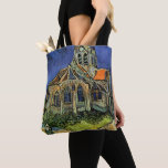 Tote Bag Vincent van Gogh - L'église d'Auvers<br><div class="desc">L'église d'Auvers (1890) de Vincent van Gogh est un Post impressionnisme vintage de peinture religieuse architecturale. Une femme se promenant le long d'un chemin vers la chapelle du village avec de beaux vitraux. Une scène architecturale de la vie quotidienne. À propos de l'artiste : Vincent Willem van Gogh (1853-1890) était...</div>