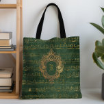 Tote Bag Vintage Monogram Crest Music Manuscrit Vert Or<br><div class="desc">Cet élégant design vintage présente un manuscrit manuscrit manuscrit manuscrit en feuille de couleur or sur un arrière - plan émeraude foncé et or en détresse. Personnalisez-le avec votre monogramme initial en police gothique,  décliné par un cadre orné d'antiquité en crête dorée.</div>