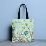 Tote Bag Whimsical Moderne Floral Nature Nom de la fille<br><div class="desc">Ce design floral mignon et capricieux présente des fleurs et des libellules avec votre nom personnalisé. Personnalisez en modifiant le texte dans la zone de texte fournie. #floral #flowers #botanical #fleurs #dragonfly #nature #fourre-tout #totes #sacs #sacs fourre - touts #accessoires #cadeaux #giftsforher #girly #personalizedcadeaux</div>