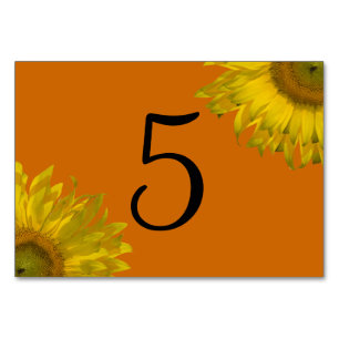 Tournesol jaune sur les numéros de table orange