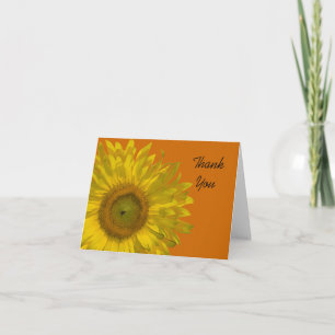 Tournesol jaune sur Merci orange