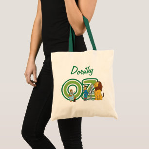 Toverachtige Wizard of Oz-figuren en tekstletters Tote Bag