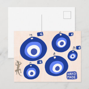 Traditionele Griekse decoratie met hagedis en boze Briefkaart