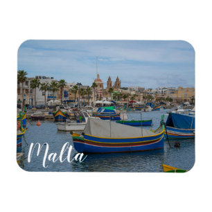Traditionele kleurrijke vissersboten op Malta Magneet