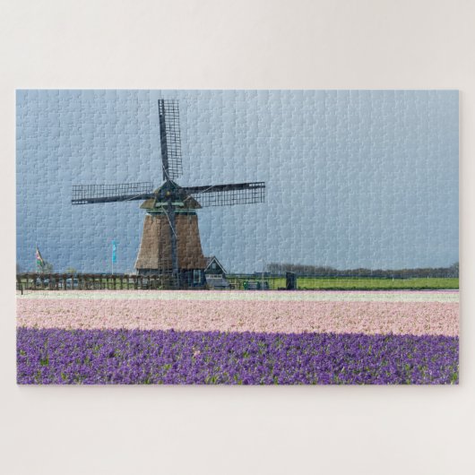 Traditionele windmolen met roze en paarse bloemen legpuzzel (Horizontaal)