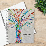 Tree Of Life Rainbow Colors Custom Name 2023<br><div class="desc">This unique Planner is decorated with a brightly colored Tree of Life on a pale gray background. The original design was made in mosaic using tiny pieces of brightly colored glass. Customize it with your name and year. Use the Design Tool option to change the text size, style, or color....</div>