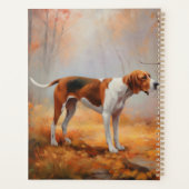 Treeing Walker Coonhound dans les feuilles d'autom (Dos)
