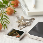 Tric-trac-spelers met een dame en haar hond sleutelhanger (Zijkant)