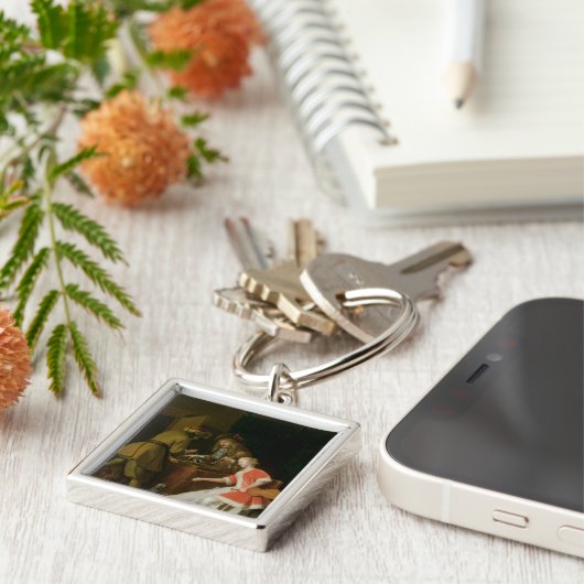 Tric-trac-spelers met een dame en haar hond sleutelhanger (Zijkant)