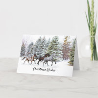 Trois Chevaux à la galopante dans la carte de Noël