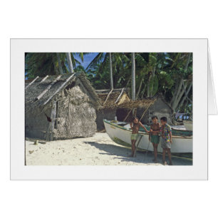 Trois enfants sur la plage à PUKAPUKA